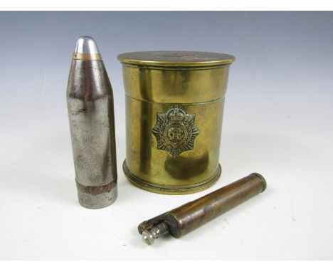 A First World War trench art 18-pr shell case tobacco jar bearing an Army Service Corps cap badge, together with two trench a