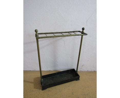 A 19th Century brass and cast iron stick stand, 61 cm 