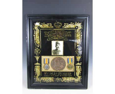 A British War and Victory Medal with Memorial plaque to 3/8229 Pte Patrick Tomkins, 1st Garrison Battalion Seaforth Highlande