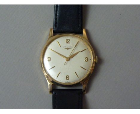 A 1960s Longines 9ct gold wrist watch having a calibre 280 manual-wind 17-jewel movement, silver face with raised gilt Arabic