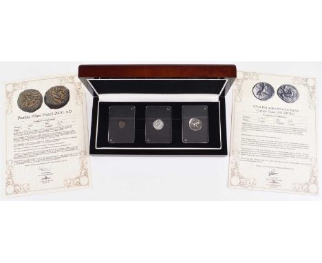 Boxed set of three ancient coins (3). Boxed set of three ancient coins to include an ancient Greek silver Tarentum Didrachm (