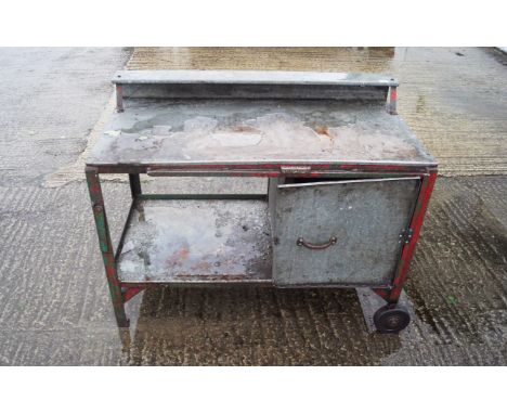 An industrial trolley work bench