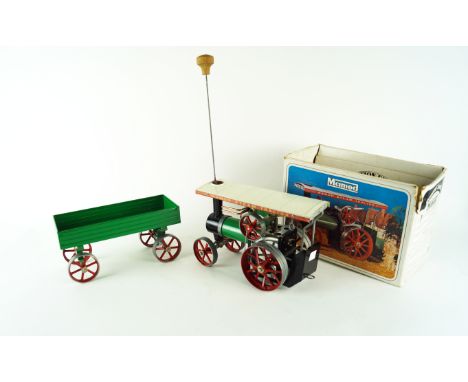 A Mamod tractor and trailer