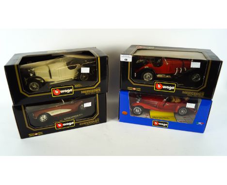 A collection of four 1:18 scale die cast model cars