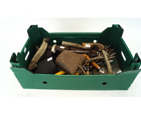 A group of sheep bells and tools