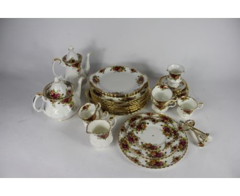 A Royal Albert Old Country Roses 60 piece part tea and coffee service, including tea pot and cover and coffee pot and cover (