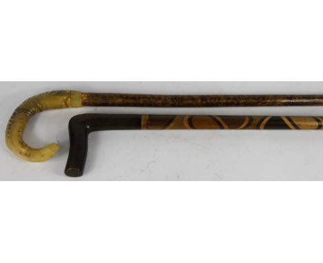 An early 20th century specimen wood inlaid walking stick; together with a horn handed walking stick, 85cm & 90cm (2)