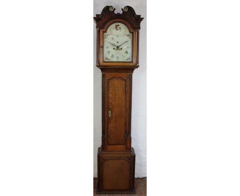 A George III oak longcase clock by James Joyce of Whitchurch, the painted enamel dial with Roman numerals and movement striki