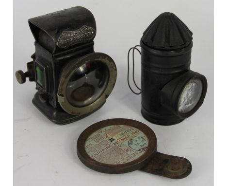 A Jos Lucas Ltd Pathfinder bicycle lamp; a small signalling lamp and a tax disc holder (3) 