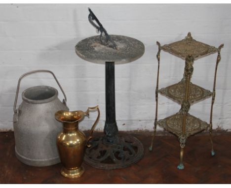 A sundial on associated stand; a box containing a quantity of weights; brass pitcher, a brass three tier stand, a milk churn 