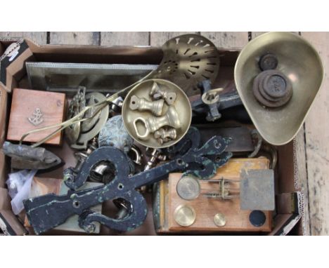 A set of brass postal scales, a brass and cast iron kitchen scales, a pair of hinge straps, and other items