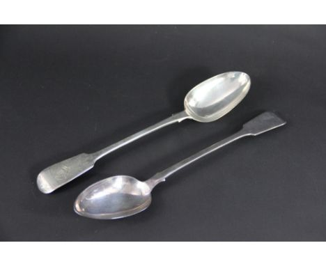 A silver fiddle pattern serving spoon Chawner & Co, London 1860, monogrammed 'B' with in a garter surround, 31cm long and ano