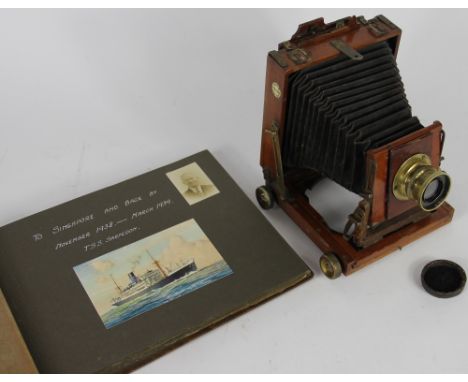 A mahogany Thornton Picard plate camera, with Rectoplant lens; with a photograph album 'Singapore and back 1938-1939' by T.S.