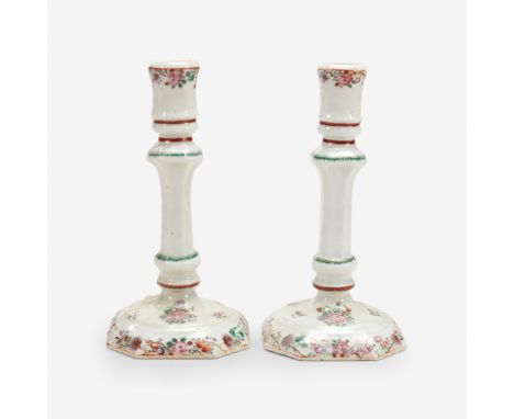 A pair of Chinese export porcelain famille rose candlesticks18th/19th centuryH: 9 in.PROVENANCE:From the collection of Dr. Mo