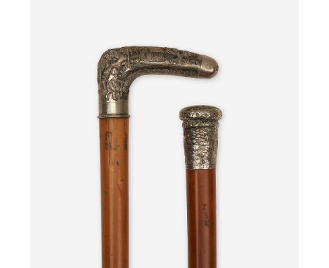 Two Anglo-Indian style measuring canes Various dates late 19th/early 20th century The first an Anglo-Persian silver and malac