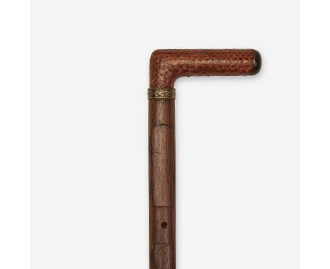 A brass-mounted ebony and rosewood artist's cane 19th century, probably French The angular snakeskin handle unscrewing to an 