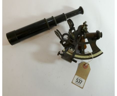 A three draw brass telescope, marked 'W Otterway and Co Ealing London 1915' together with a small brass sextant and a brass p