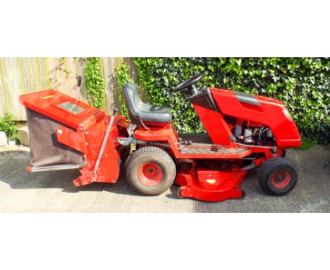 A Countax ride on rotary motor mower with twin cylinder engine and 42" cutting deck complete with the grass box 