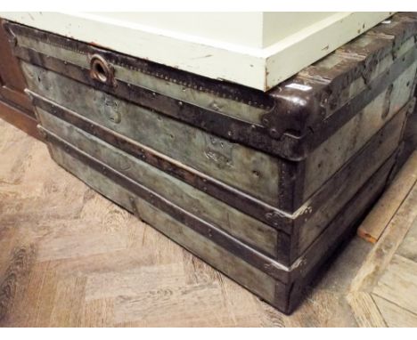 A heavy iron bound trunk 