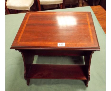 A small Edwardian inlaid mahogany tabletop book shelf 