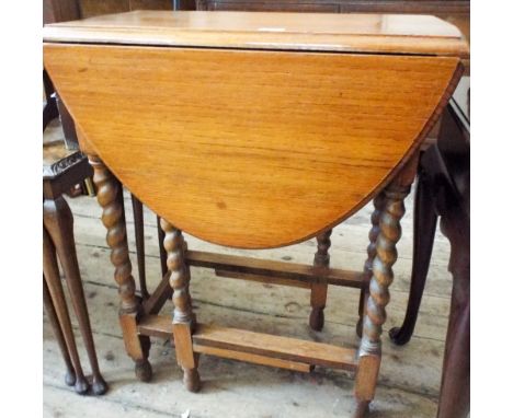 An oak gate legged table on barley twist legs 2' wide 