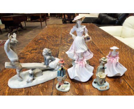 Royal Doulton lady figure 'Autumn', a Lladro figure of children on a seesaw, two small Coalport lady figures and two clown or