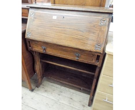 An oak students type bureau fitted one drawer and shelf under 2'6 wide 