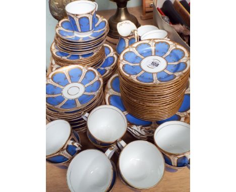 Blue white and gilt bordered tea service      Some wear to gilding - particularly to large plates, milk jug is chipped, but n
