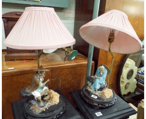 A pair of Chinese figure table lamps and a brass table lamp 