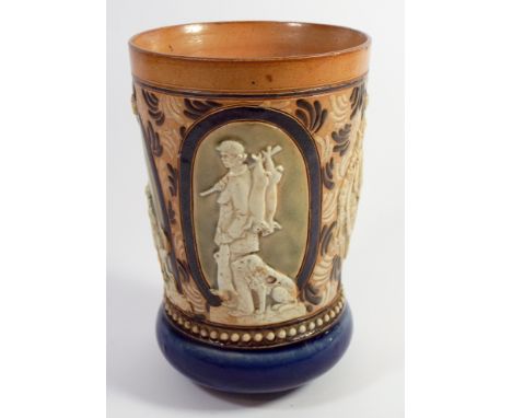 A Doulton beaker decorated with various scenes of hunting from the British Isles, English fox hounds and a Scottish highland 