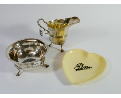 Hallmarked silver sugar basin and matching cream jug 6.6 troy ozs together with an Ivorine heart shaped pin tray with silver 