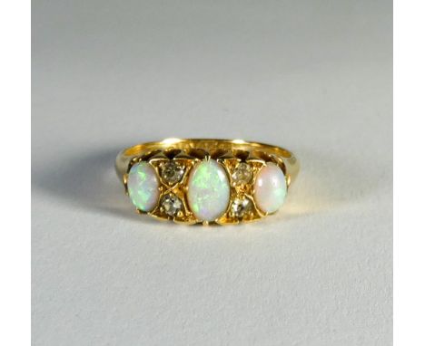 Victorian 18ct gold opal and diamond half hoop ring, ring size L, together with a red stone and diamond three stone ring, siz