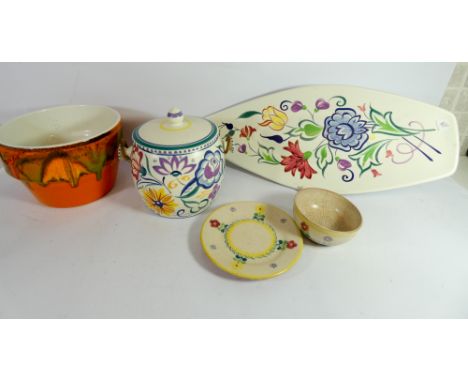 A collection of Poole Pottery to include a leaf shaped plate and an early Carter Stabler Adams dish and saucer