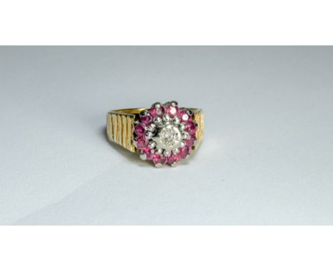 18ct gold ruby and diamond cluster ring, gross weight 7.1g, ring size L 