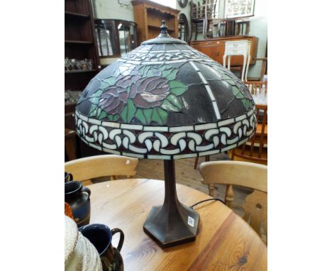 A Tiffany style electric table lamp with shade