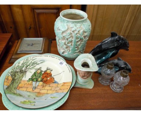 A wall barometer, two Poole pottery fish, plates, vase etc 