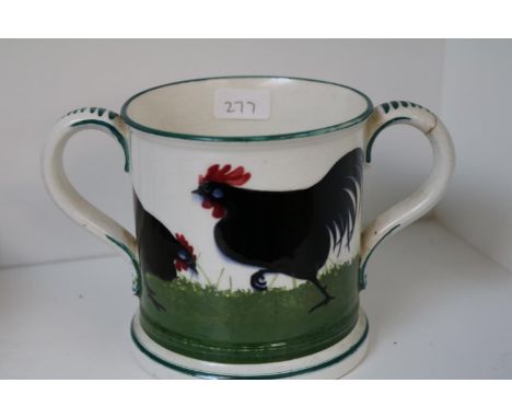 A Bristol Wemyss tyg, decorated with a black cockerel and hens, hand painted marks to base 10.5cm in Height 