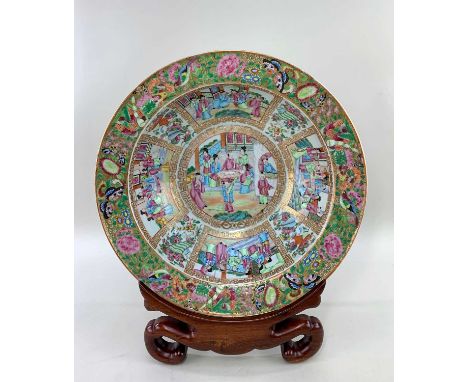CANTON FAMILLE ROSE PORCELAIN BASIN, 19th Century, broad everted rim painted with insects and flowers, cavetto with four pane