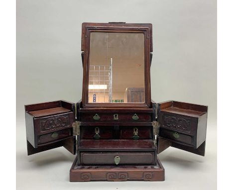 CHINESE HONGMU PORTABLE TOILET BOX, with brass handles, clasps and locks, the hinged top fitted with mirror, the front openin