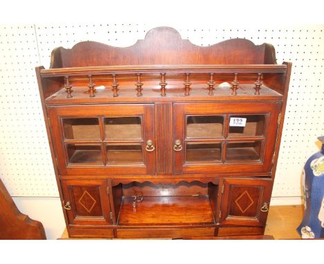 19thC Mahogany Smokers cabinet with glass panel doors under gallery top. 