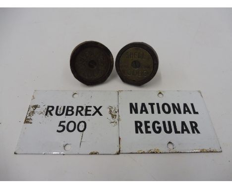 Two enamel petrol pump brand indicators comprising National Regular and Rubrex 500 and two brass stoppers.