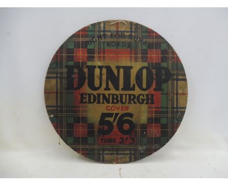 A Dunlop Edinburgh Tyres tartan patterned circular cardboard advertisement, 26" diameter. 