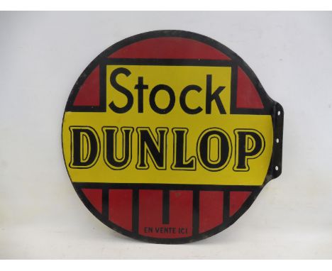A Continental Dunlop circular double sided enamel sign with hanging flange, 19 3/4" diameter. 