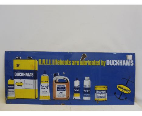 A Duckhams RNLI Lifeboats Lubrication enamel sign showing the various products, 54 x 22". 