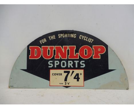 A Dunlop Sports semi-circular cardboard advertisement, 24 x 12". 