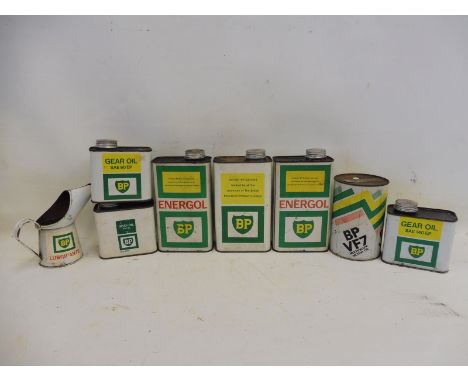A box of mixed BP Lubricants oil cans and an oil measure.