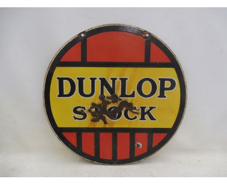 A Dunlop Stock circular double sided enamel sign, 24" diameter.