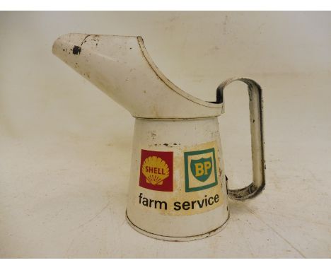 A Shell and BP Farm Service pint oil measure. 