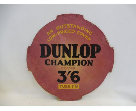 A Dunlop Champion cardboard advertisement, 27 3/4 x 27 3/4". 