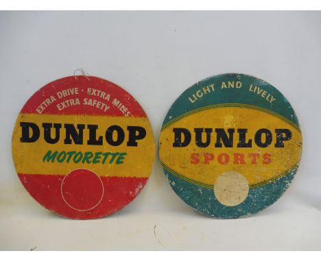 Two circular Dunlop cardboard advertisements, each approximately 24" diameter.
